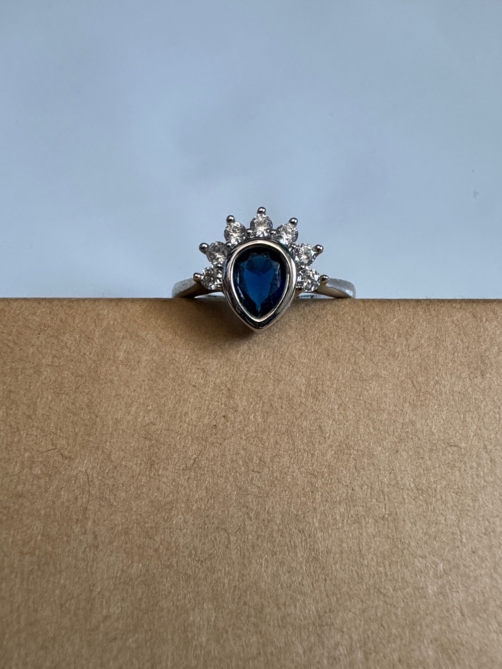 Blue Teardrop Halo Ring with Clear Accent Stones Size 9